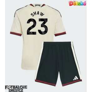 Manchester United Luke Shaw #23 Dětské Alternativní dres komplet 2026-27 Krátký Rukáv (+ trenýrky)